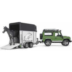A Land Rover vehicle with a horse trailer and a figurine