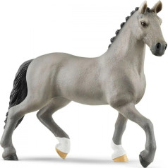 A figurine of a Cheval de Selle Francais stallion