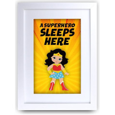 HWC Trading FR Wonder Woman - A Superhero Sleeps Here Character Nursery Print A4 Framed Kids Gifts for Kids Bedroom Poster Friends Party Gift Photo Frame Display