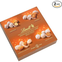 Lindt Ziemassvētku šokolādes krēms, 2 x 210 g, četras Ziemassvētku šķirnes: Šokolādes krēms, šokolādes dāvana Ziemassvētkiem, lazdu rieksti, mandeles, dedzinātas mandeles un karameļu krīze.