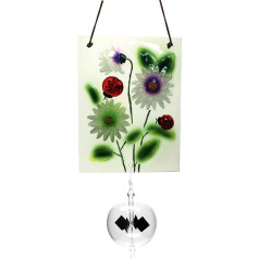 Gaismas dzirnavas ar uzlīmi uz loga - Flower